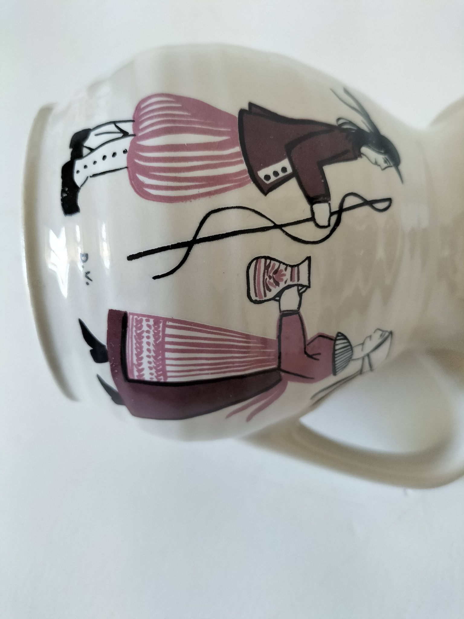 Ceramic pitcher from Quimper, created by Dominique Villard.