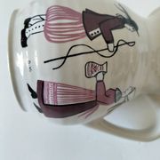 Ceramic pitcher from Quimper, created by Dominique Villard.