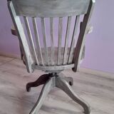 Swivel office chair in gray lacquered wood