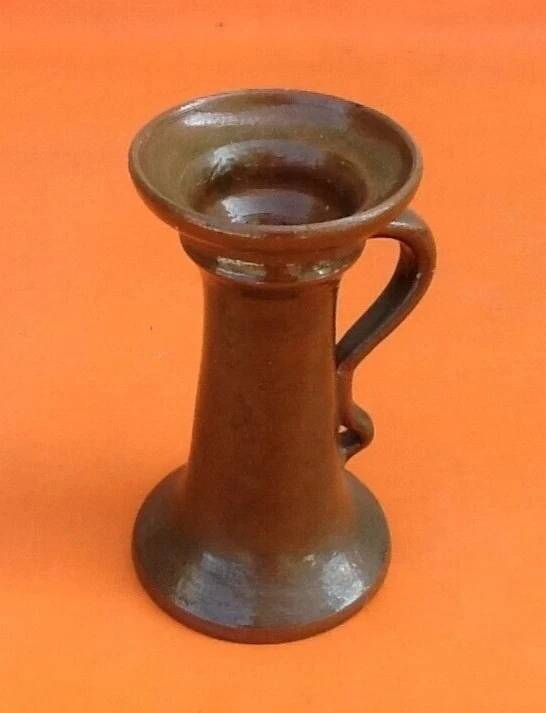 Varnished terracotta spool candlestick