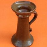 Varnished terracotta spool candlestick