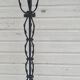 Black wrought iron floor lamp attributed to Gilbert Poillerat
