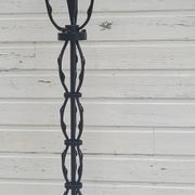 Black wrought iron floor lamp attributed to Gilbert Poillerat