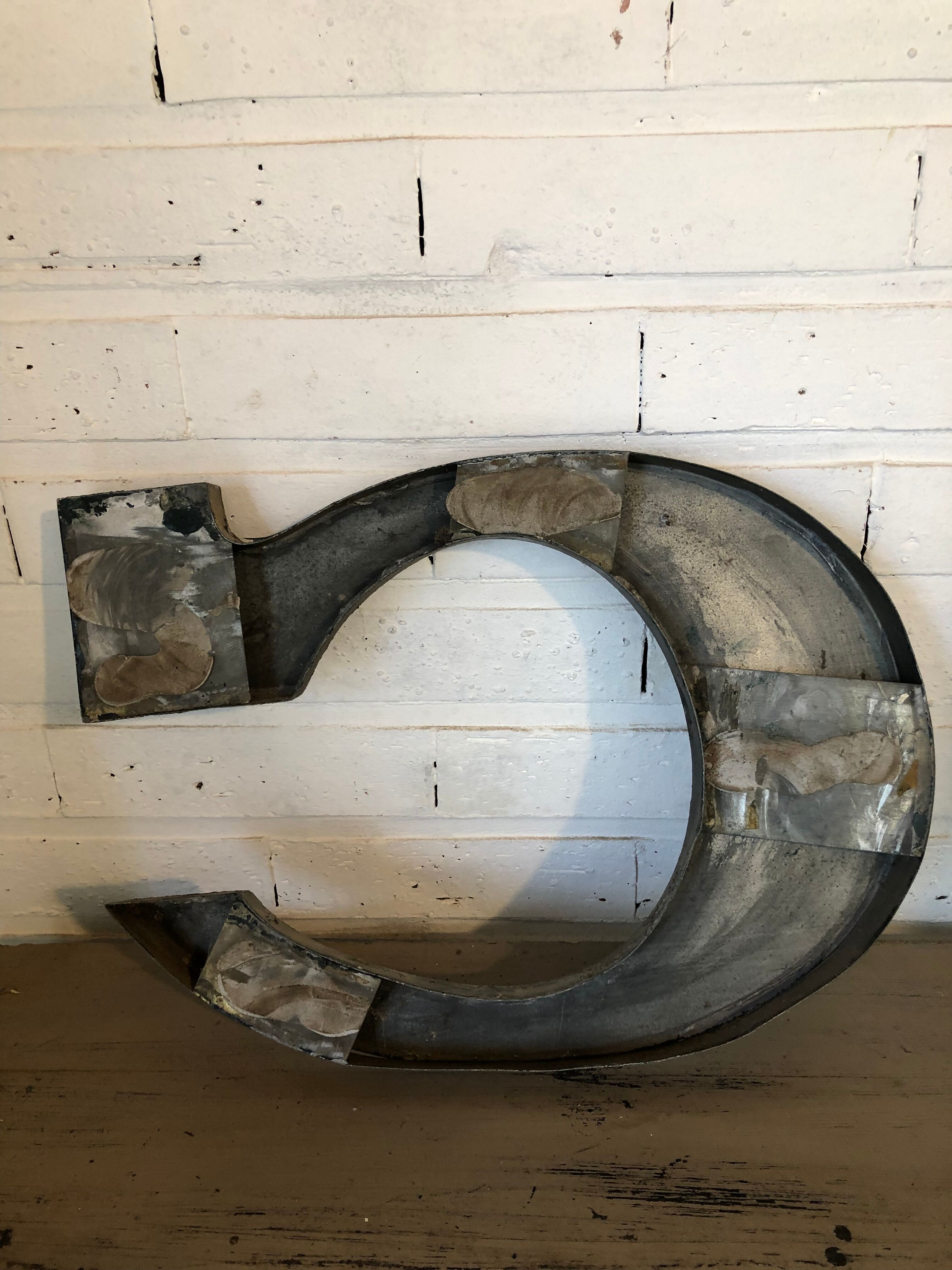 Blue sign letter "C"