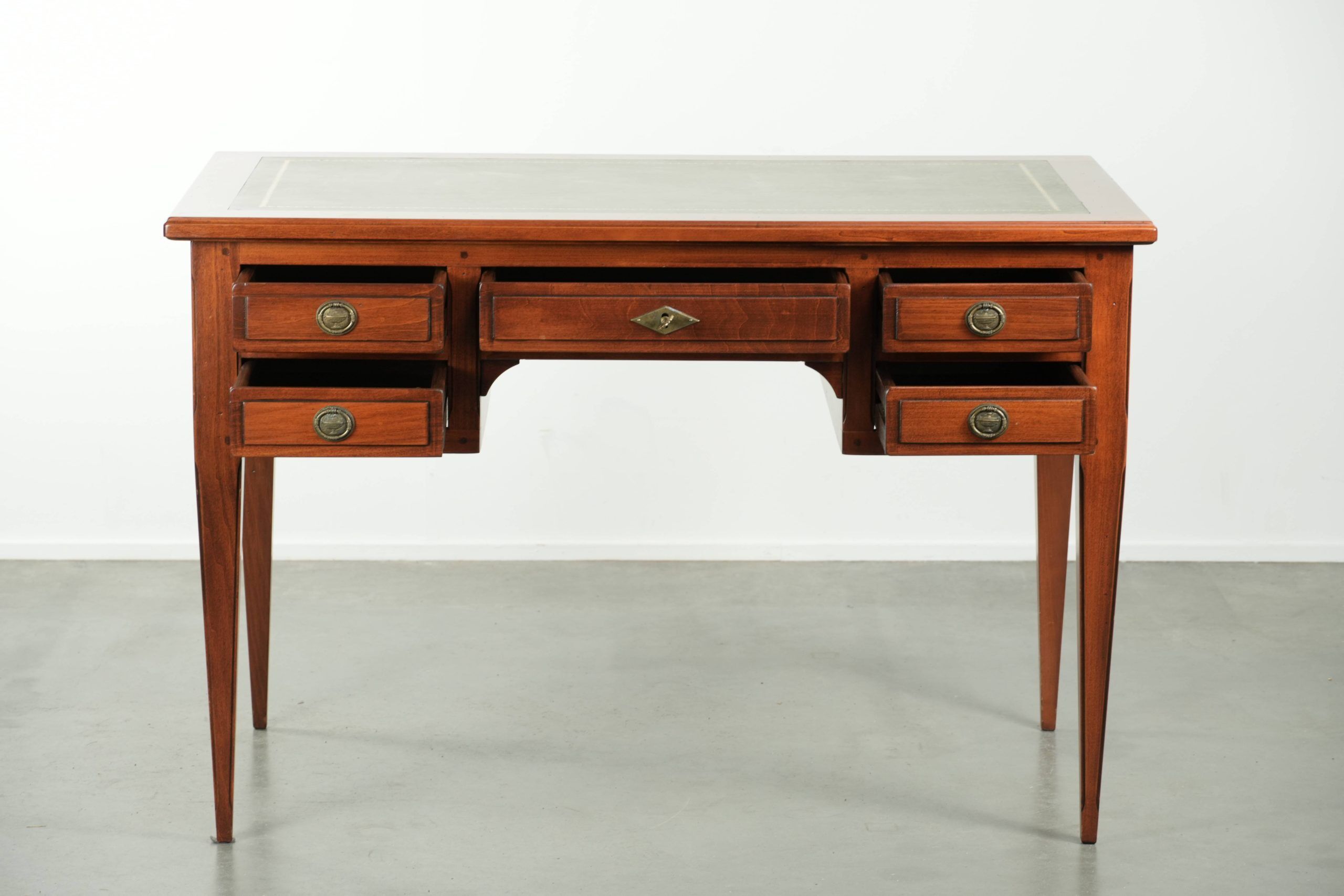 Elegant English style desk with green leather top, gold details and drawers
