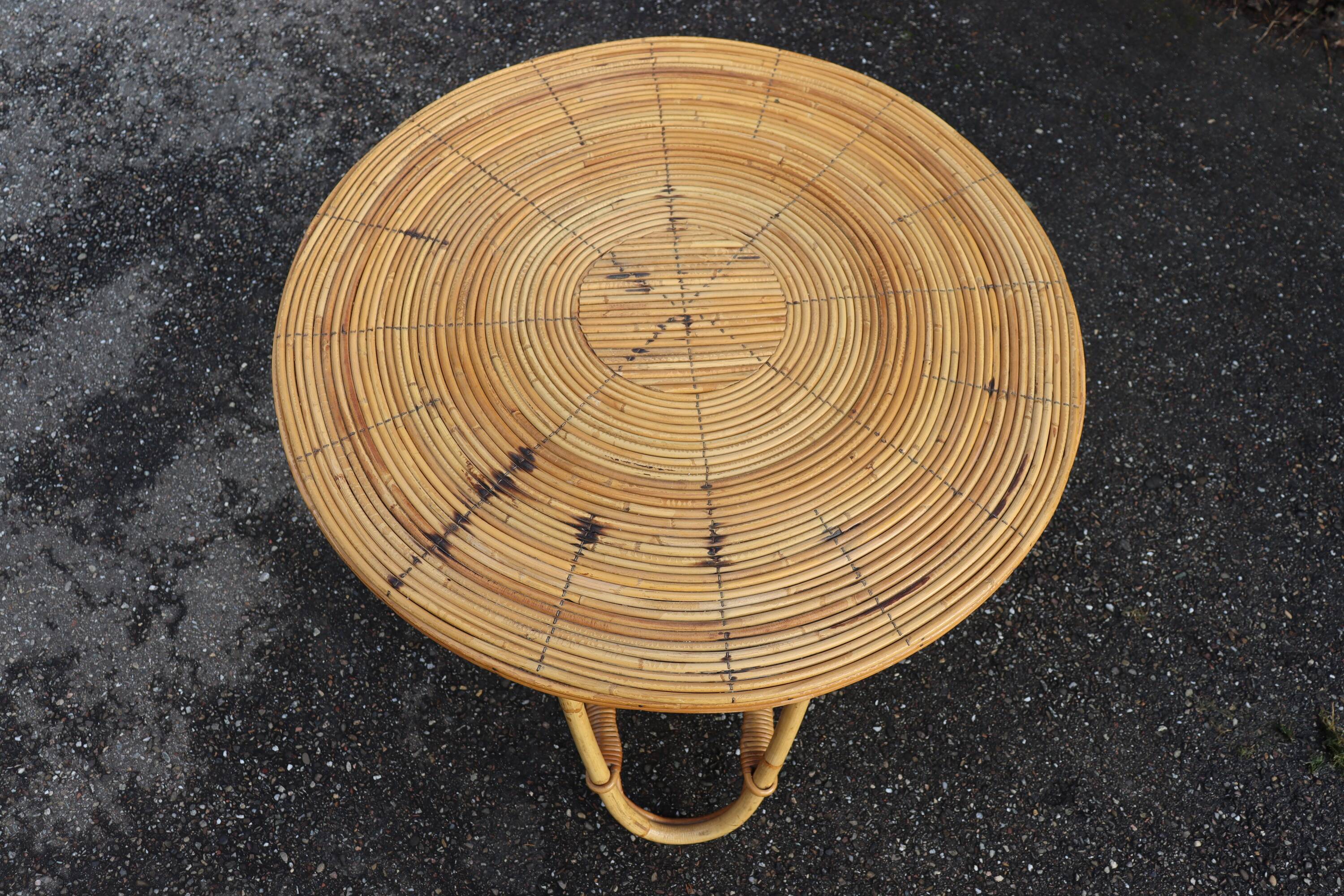 Round rattan coffee table in the Audoux Minet style