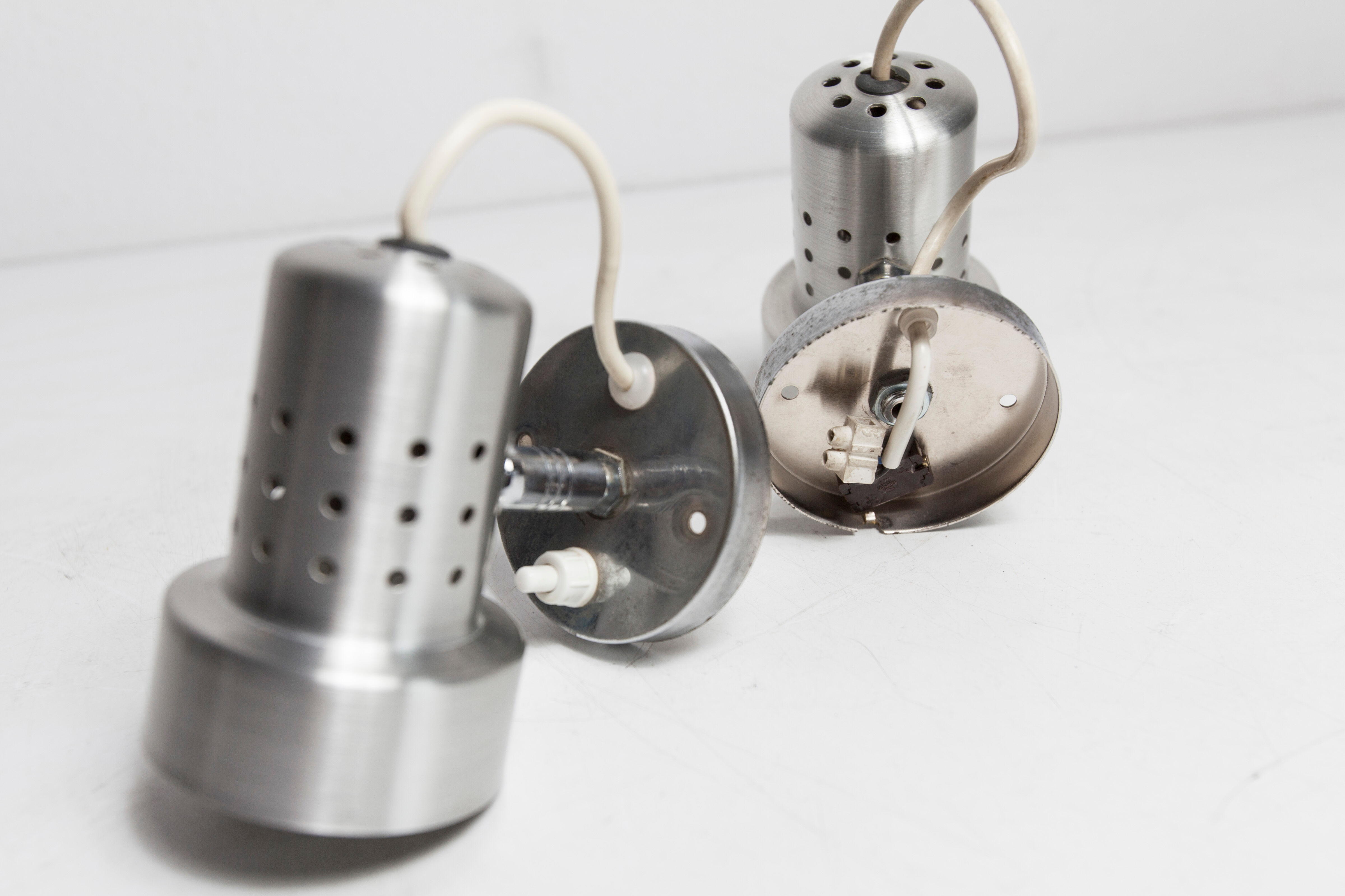 Pair of modernist wall lights in aluminum 1970