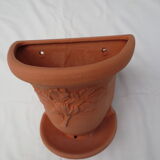 Pair of decorated terracotta wall flower pots
