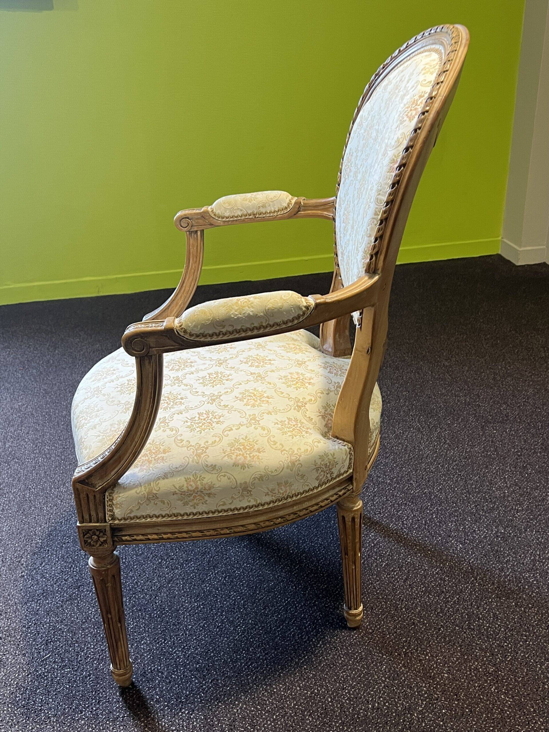 Pair of Louis XVI style armchairs, in solid walnut, re-edged and upholstered, pegged