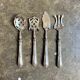 4 silver bonbon spoons engraved "HS"