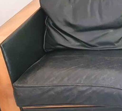 Scandinavian black leather sofa