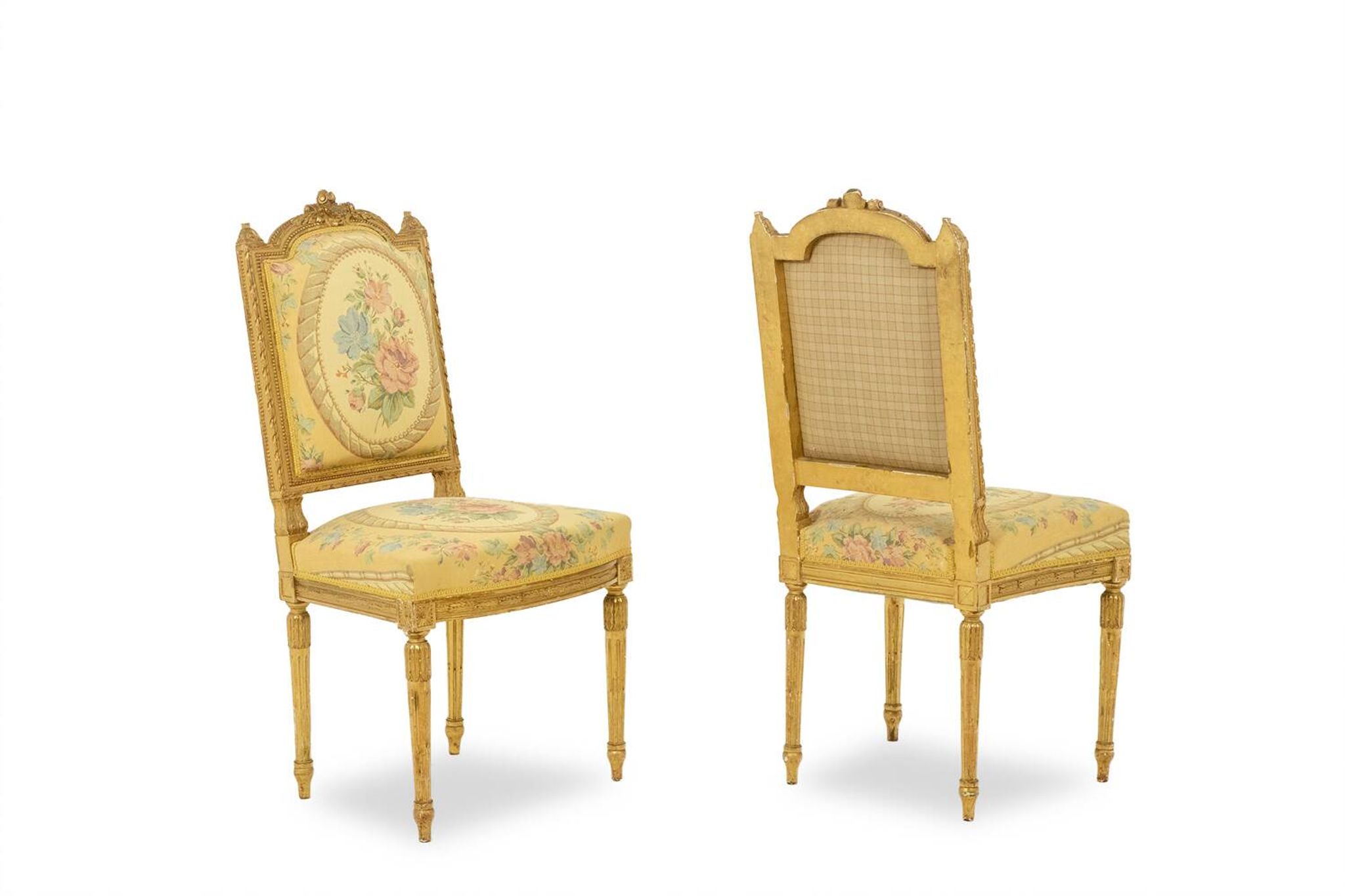 Pair of gilded wooden chairs with upholstery. Louis XVI period.