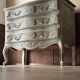 Louis XV style commode with traditional patina