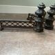 Paire de chenets en bronze style Louis XVI