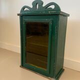 Wall vitrin with pediment