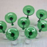8 large green stem champagne flutes in very good condition.