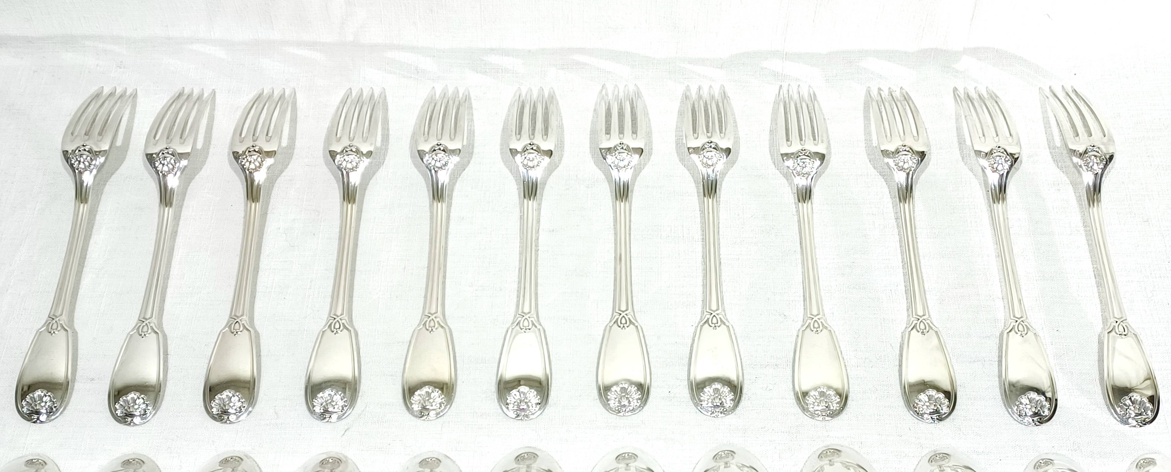 12 Louis XIV style silver cutlery sets