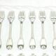 12 Louis XIV style silver cutlery sets