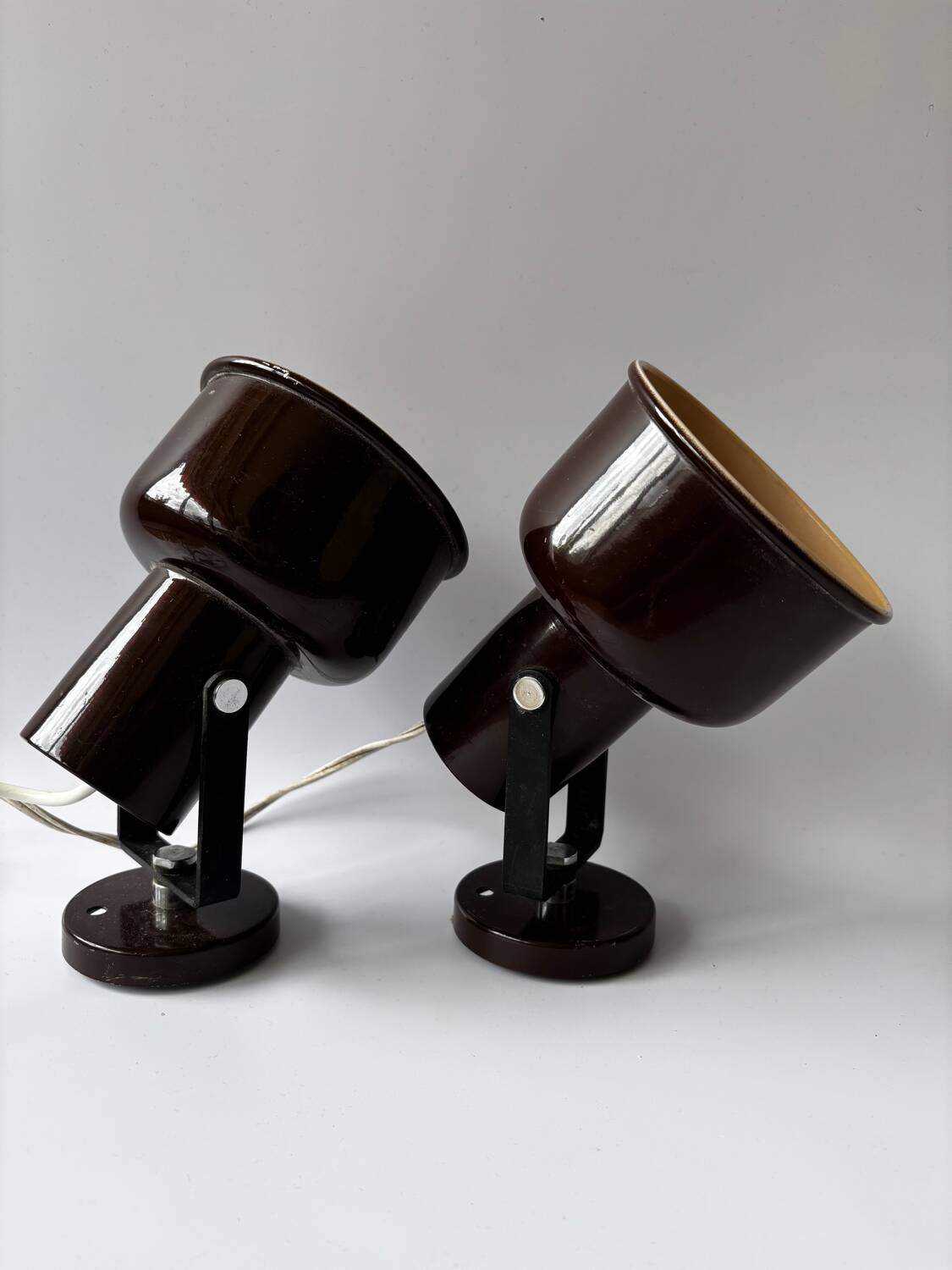 Pair of brown metal wall lights