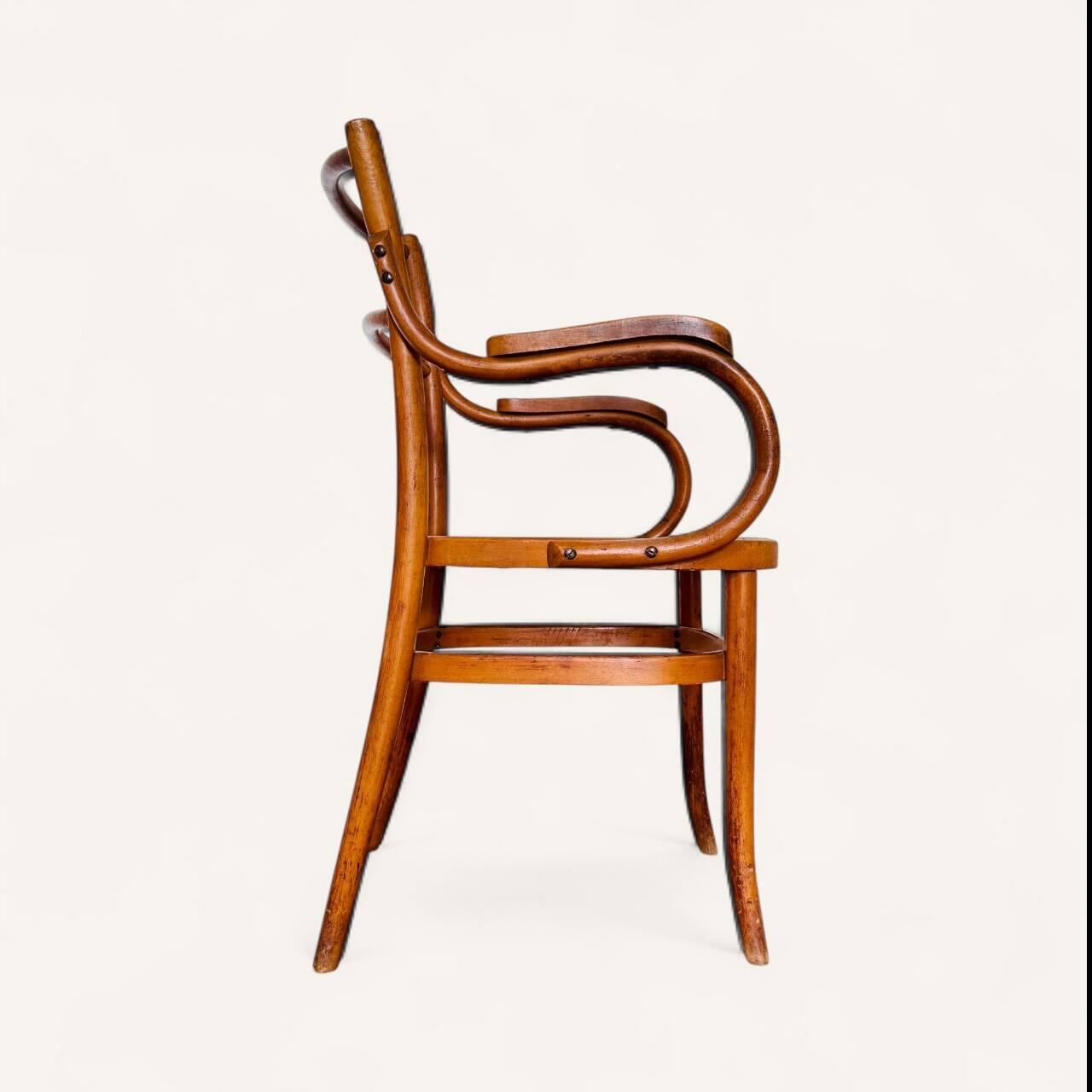1900 curved wood armchair