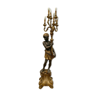 Torchère decoration of a nubian in wood and gilded stucco XX century