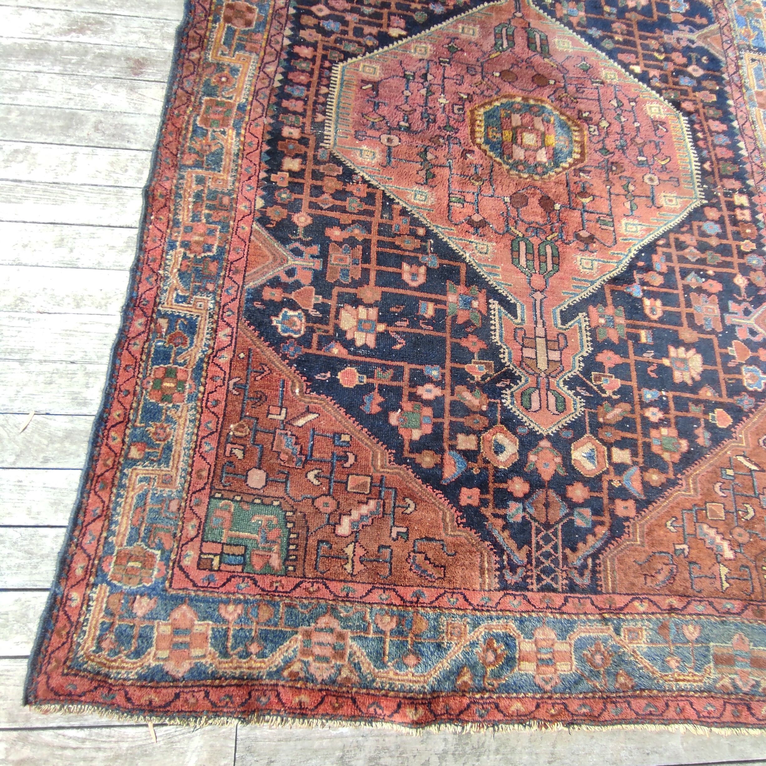 Old Persian carpet 1.62 m wide and 2.33 meters long
