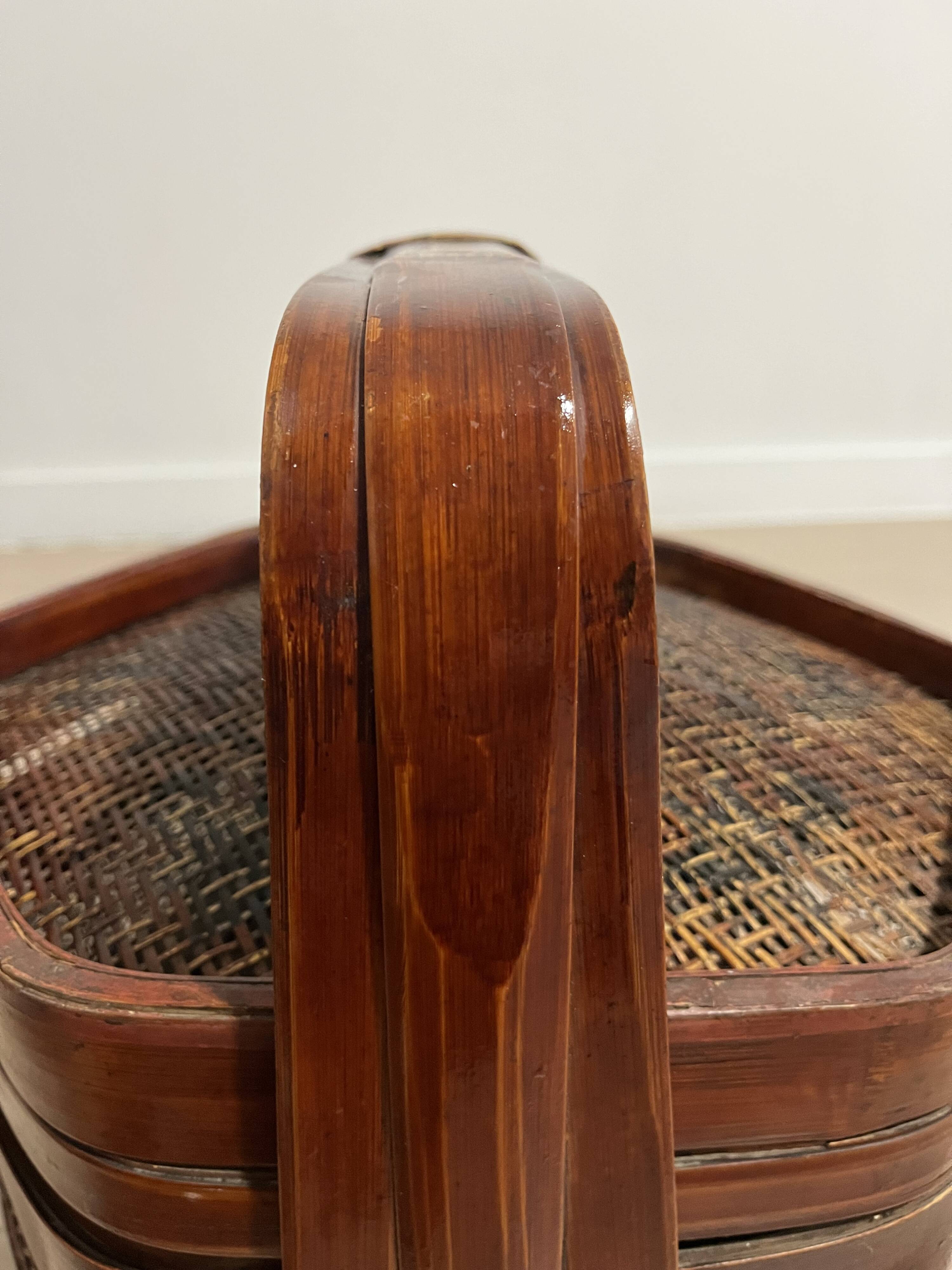 Ancient wooden and woven wicker basket,