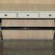 Vintage writing desk with chrome X-shaped top and patinated crocodile leather.