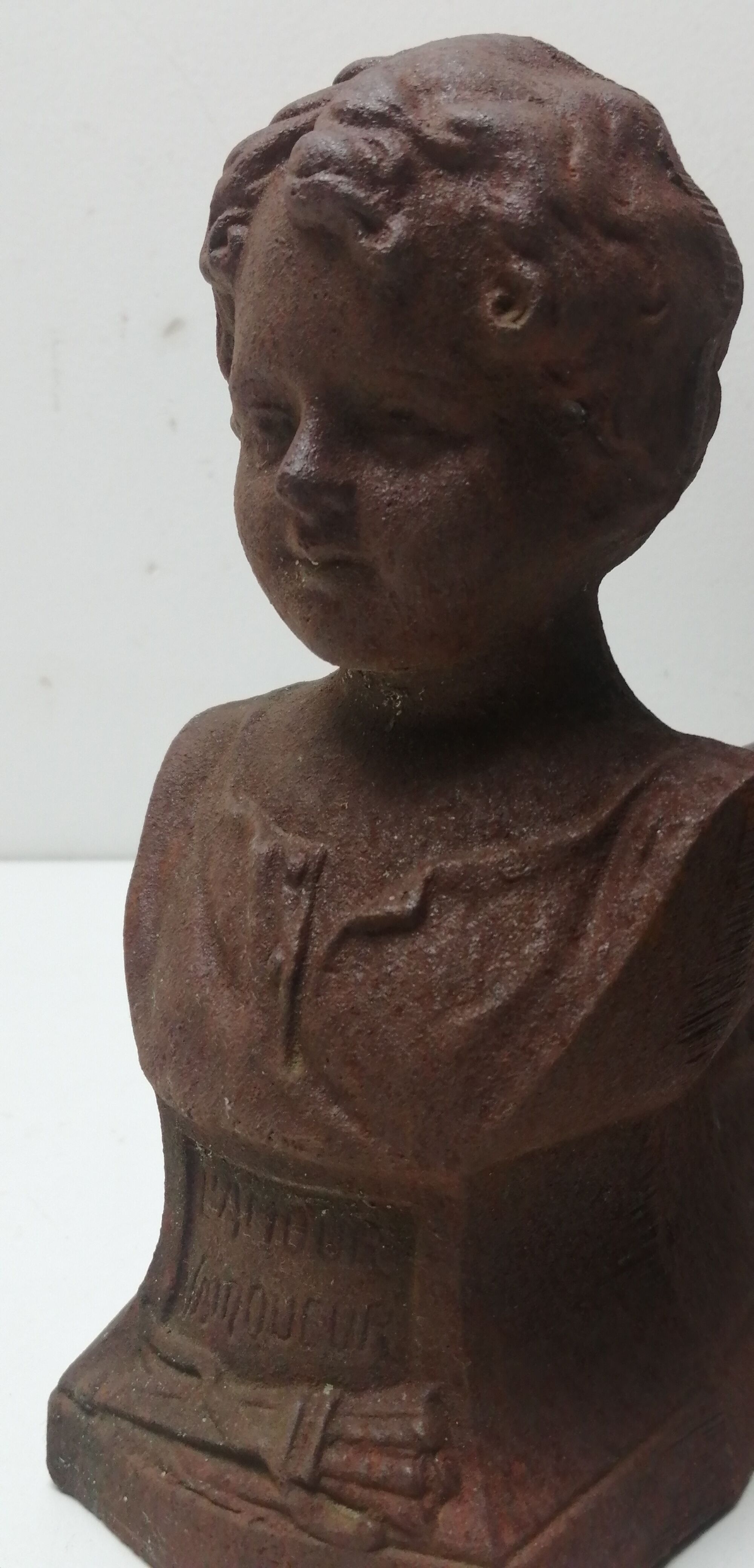 Pair of cast iron fireplace chenets "children"