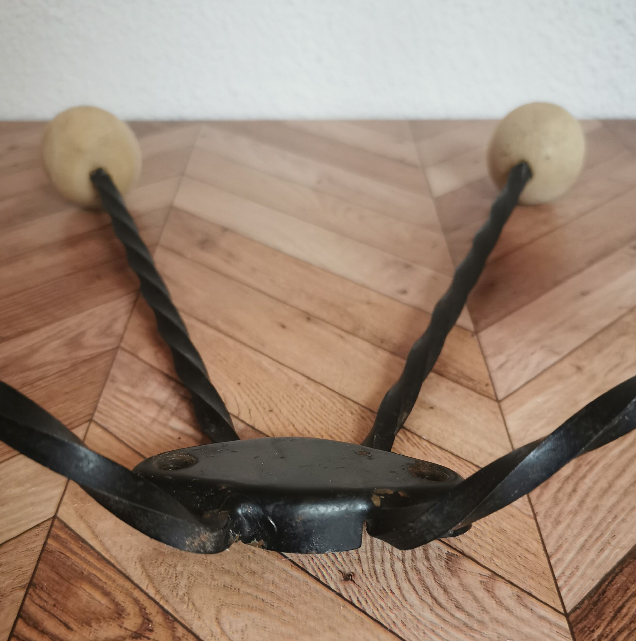 Wooden and iron wall coat holder