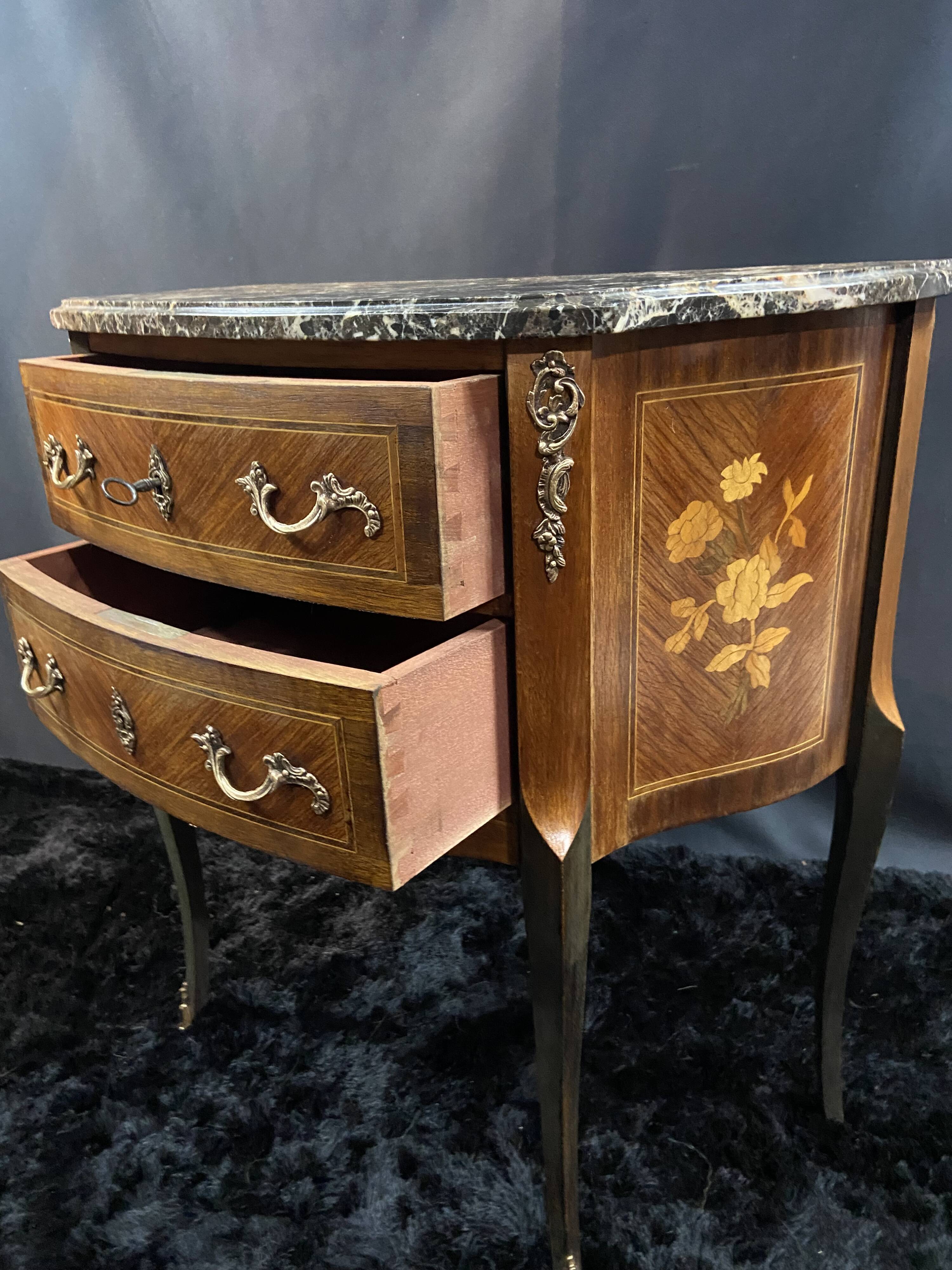 Small Louis XV style half-moon commode with marquetry and bronze decoration