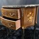 Petite commode demi-lune à décor marqueté et bronze style Louis XV