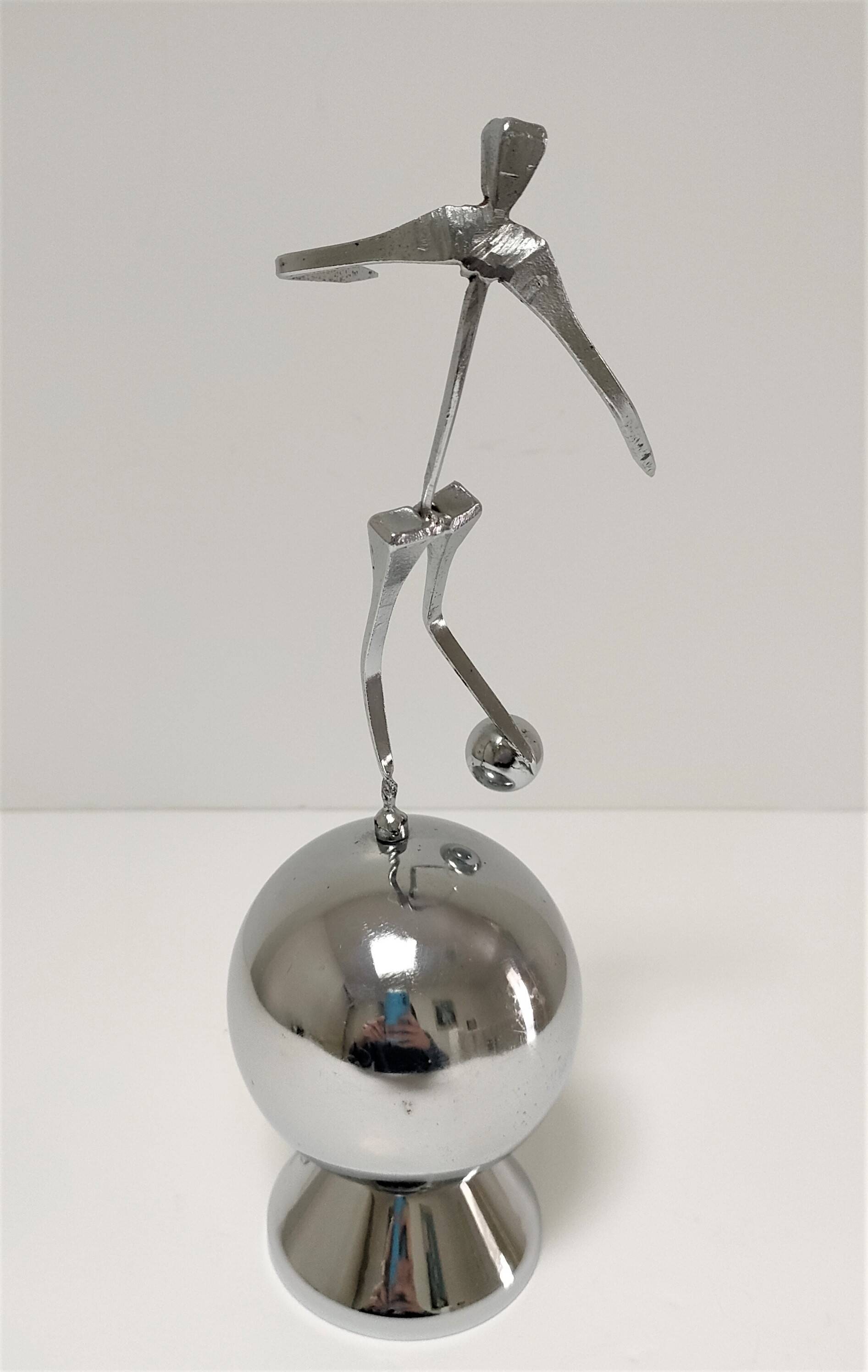 steel sculpture, sportsman's hallmark, goldsmith's crown
