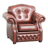 Cowhide chesterfield armchair in a warm brown colour with decorative nails