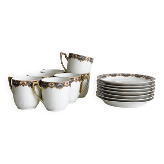 7 Limoges porcelain cups and saucers with gold decoration and floral motif.