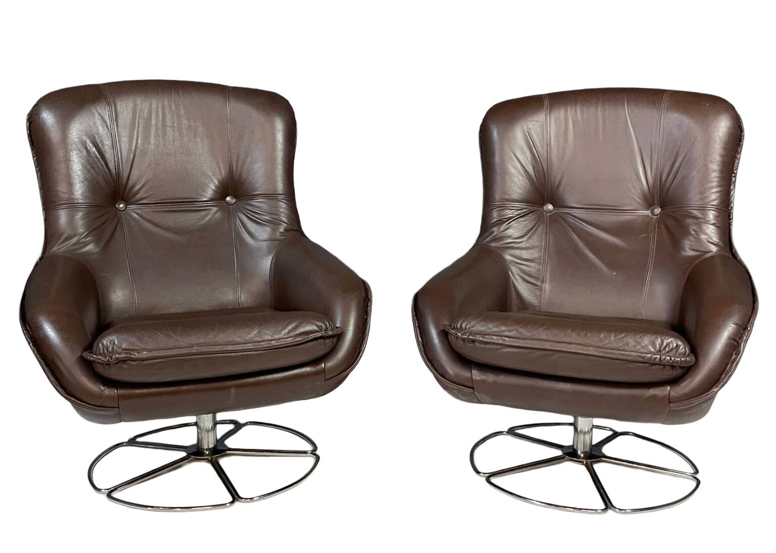 Pair of leather swivel armchairs by PEEM, Finland, 1970s