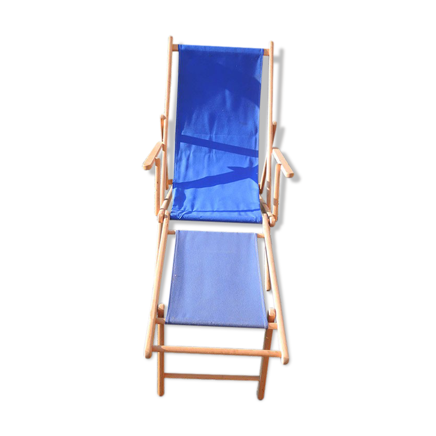 Old sunbathing in wooden & blue fabric