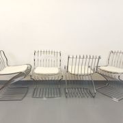 Set of 4 vintage Italian chairs by Gastone Rinaldi in chrome metal.