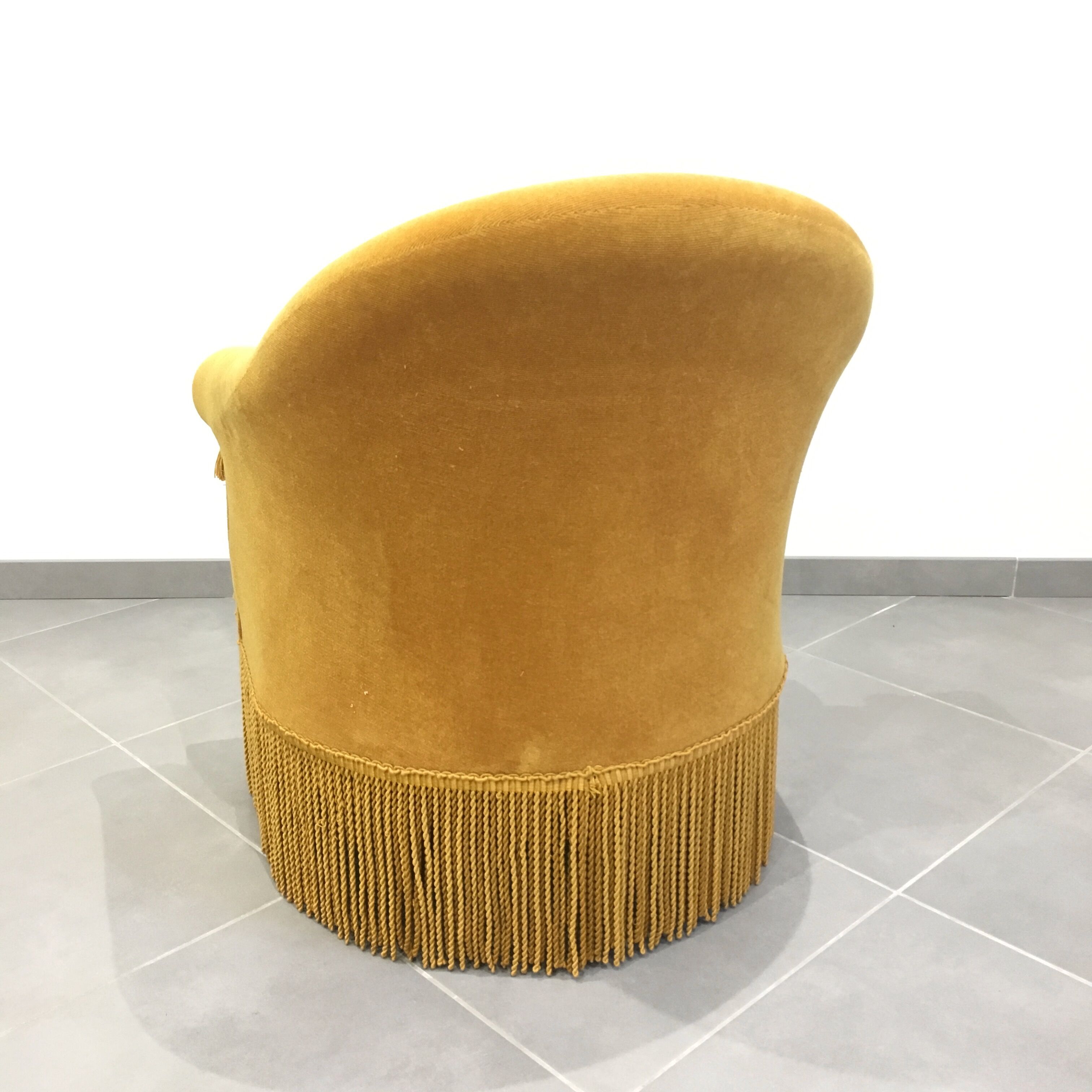 Pair of velvet fringed low chairs