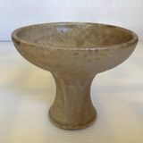 Beige ceramic chalice-shaped candle holder