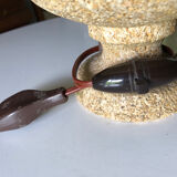 Sandstone foot accent lamp surmounted by a painted lampshade