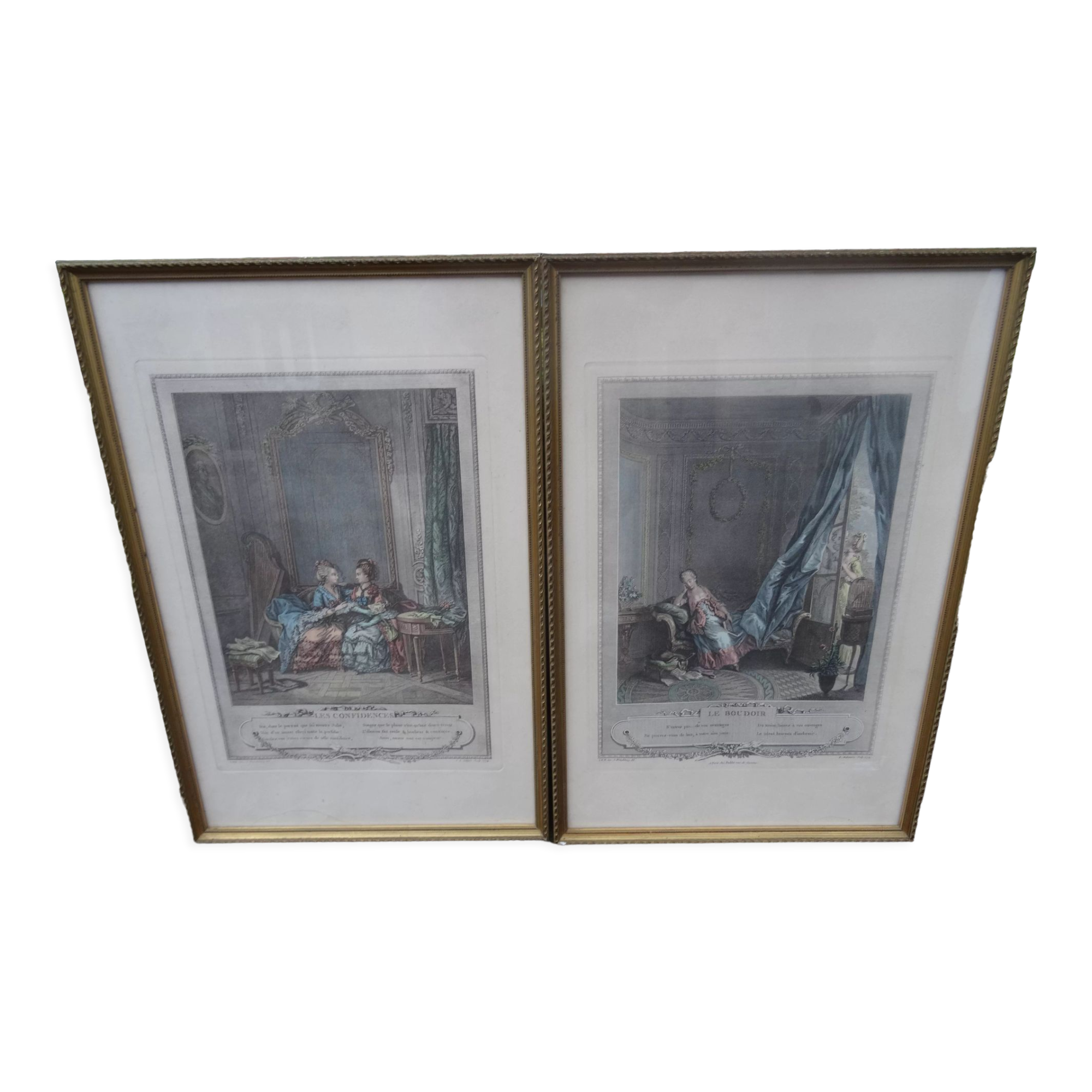 Duo of antique prints framed with canopies