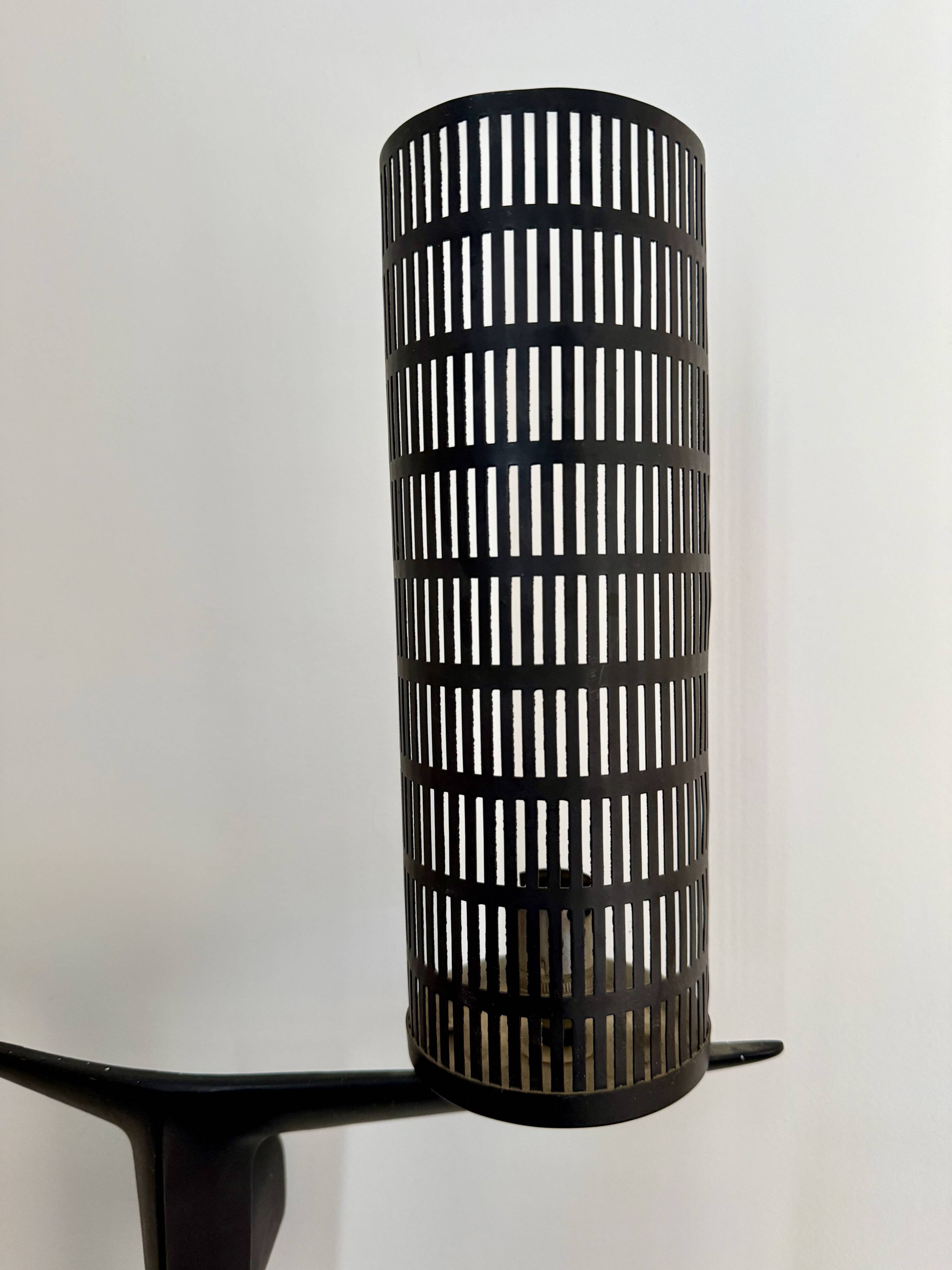 Pair of sculpted lacquered bronze wall lights, Arlus