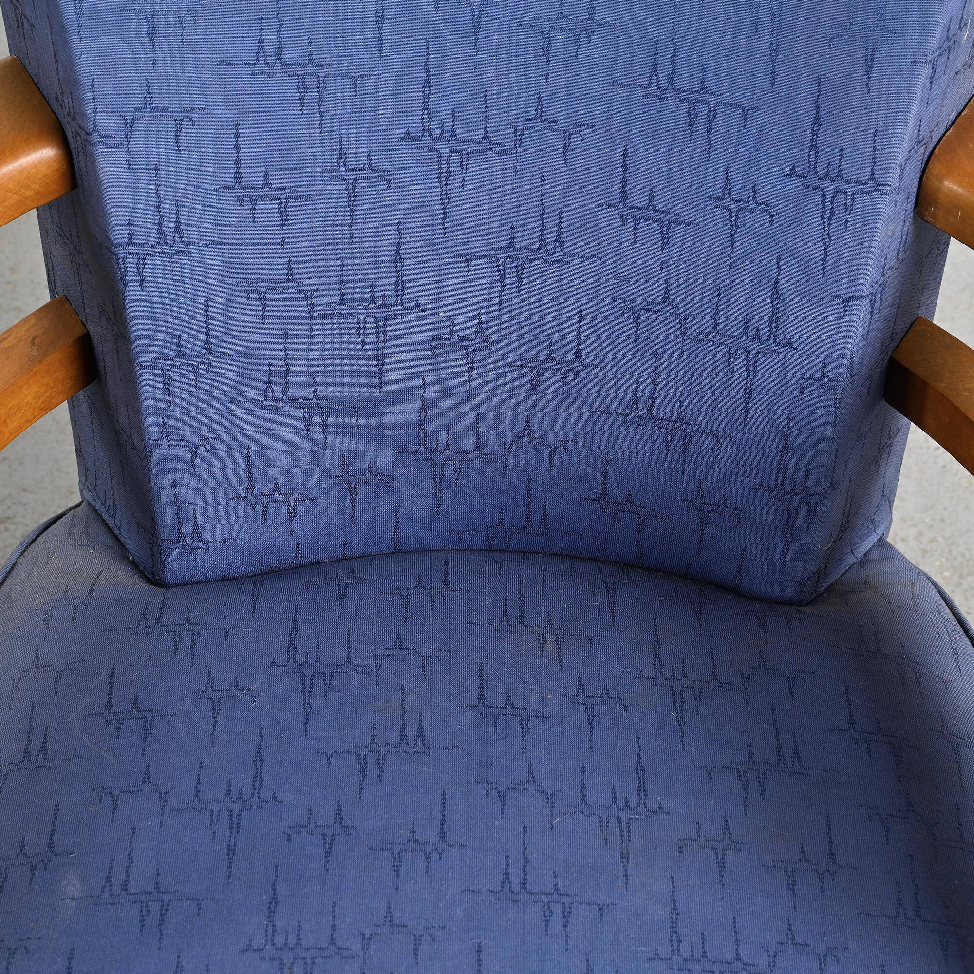 Pair of living room armchairs in solid beech, France, circa 1950.