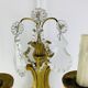 Bronze wall light with rococo style Louis XV pendants.