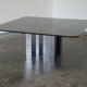 Table basse en verre fumé et chrome 1970