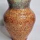 Vase en grès émaillé vert et brun moucheté – signé Accolay – 22 cm