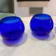 Set of 3 blue glass candle holders