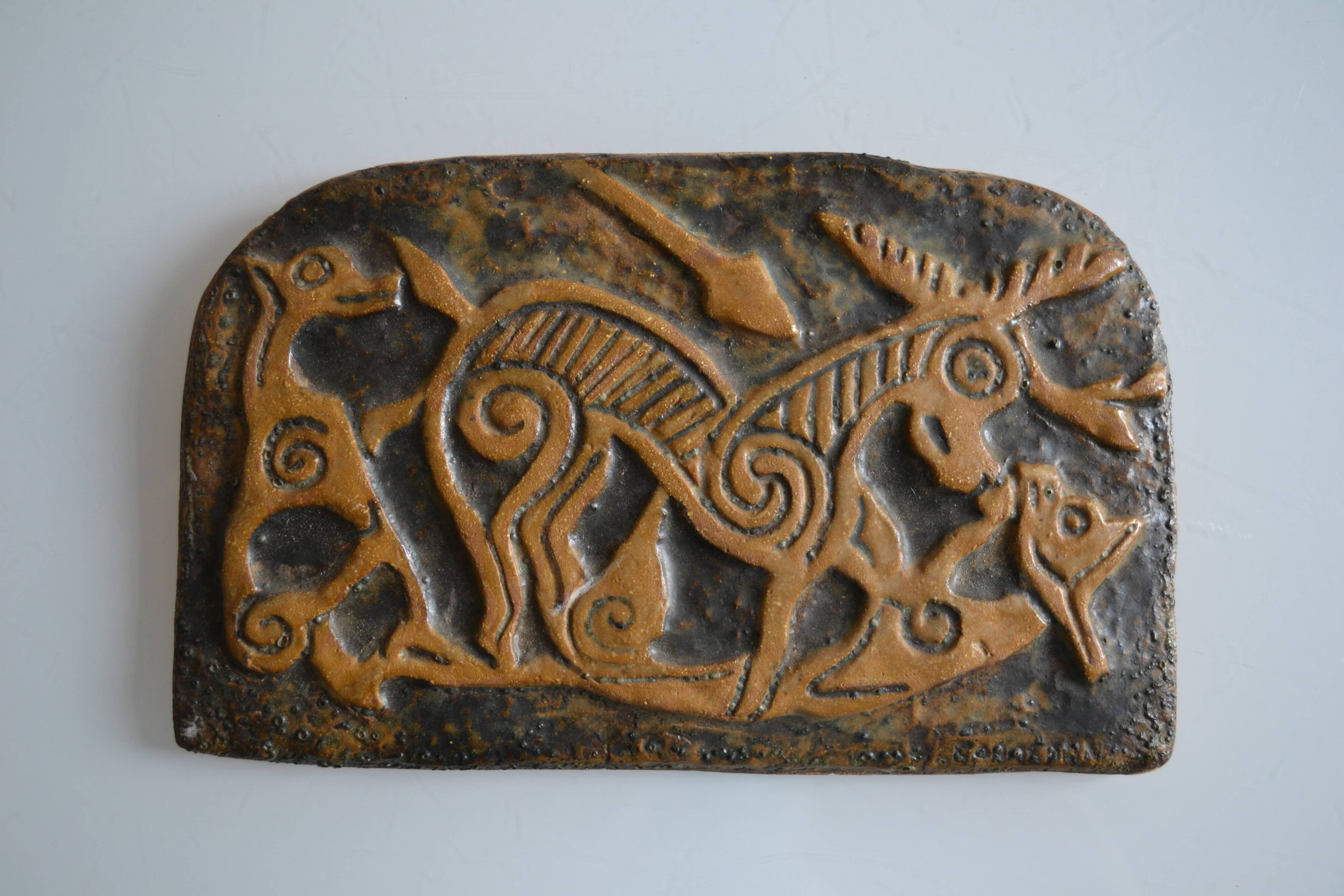 Bas-relief sculpture in terracotta inspired by the Celtic bestiary