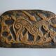 Bas-relief sculpture in terracotta inspired by the Celtic bestiary